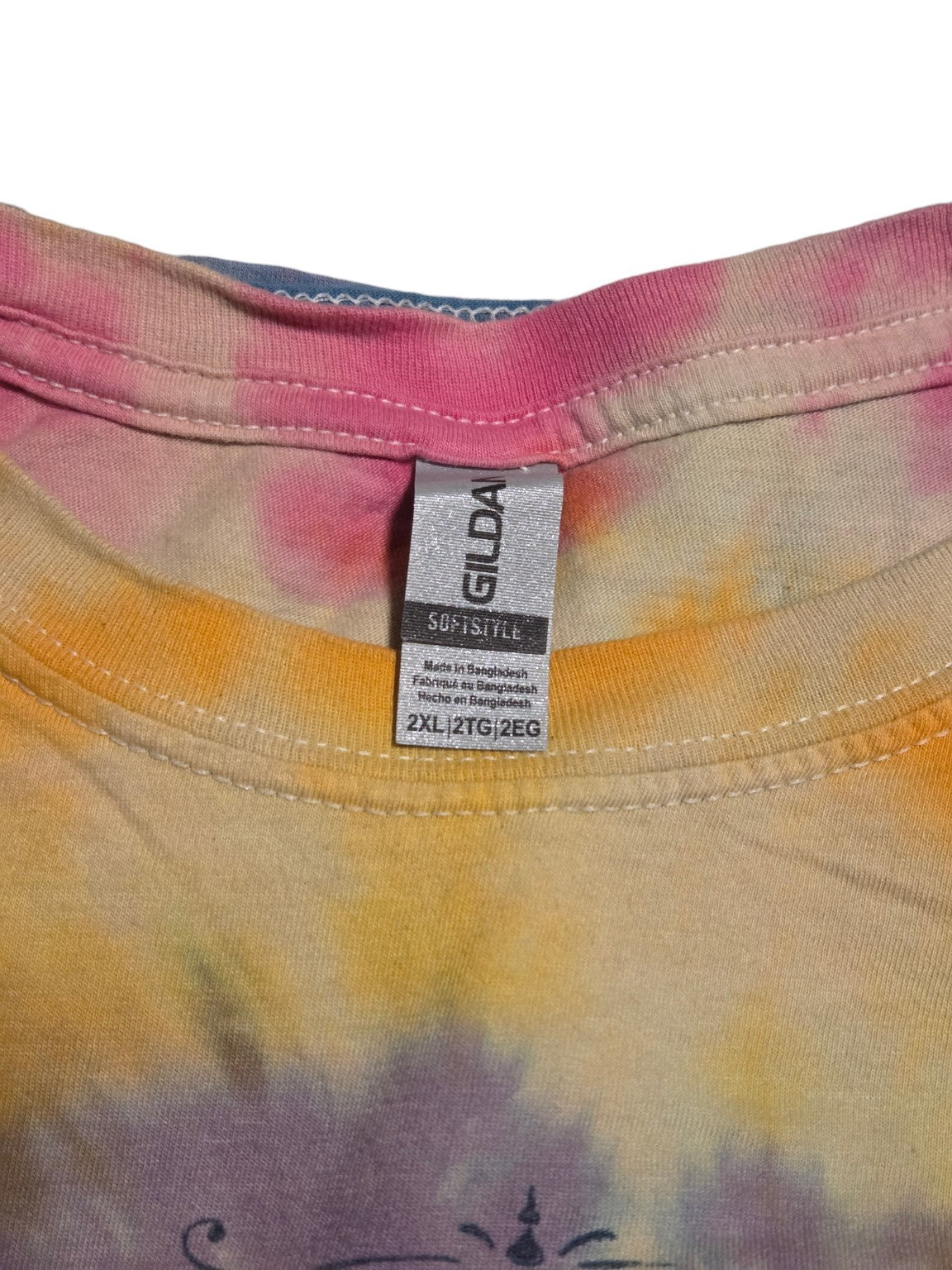 Gildan Softstyle shirt label showing size 2XL and made in Bangladesh