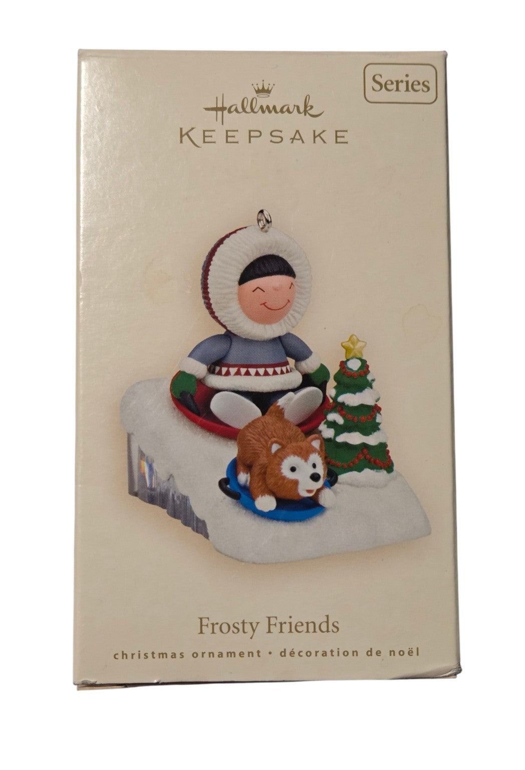 2008 Hallmark Frosty Friends 29th ornament original box front showing Frosty and husky sledding beside a Christmas tree
