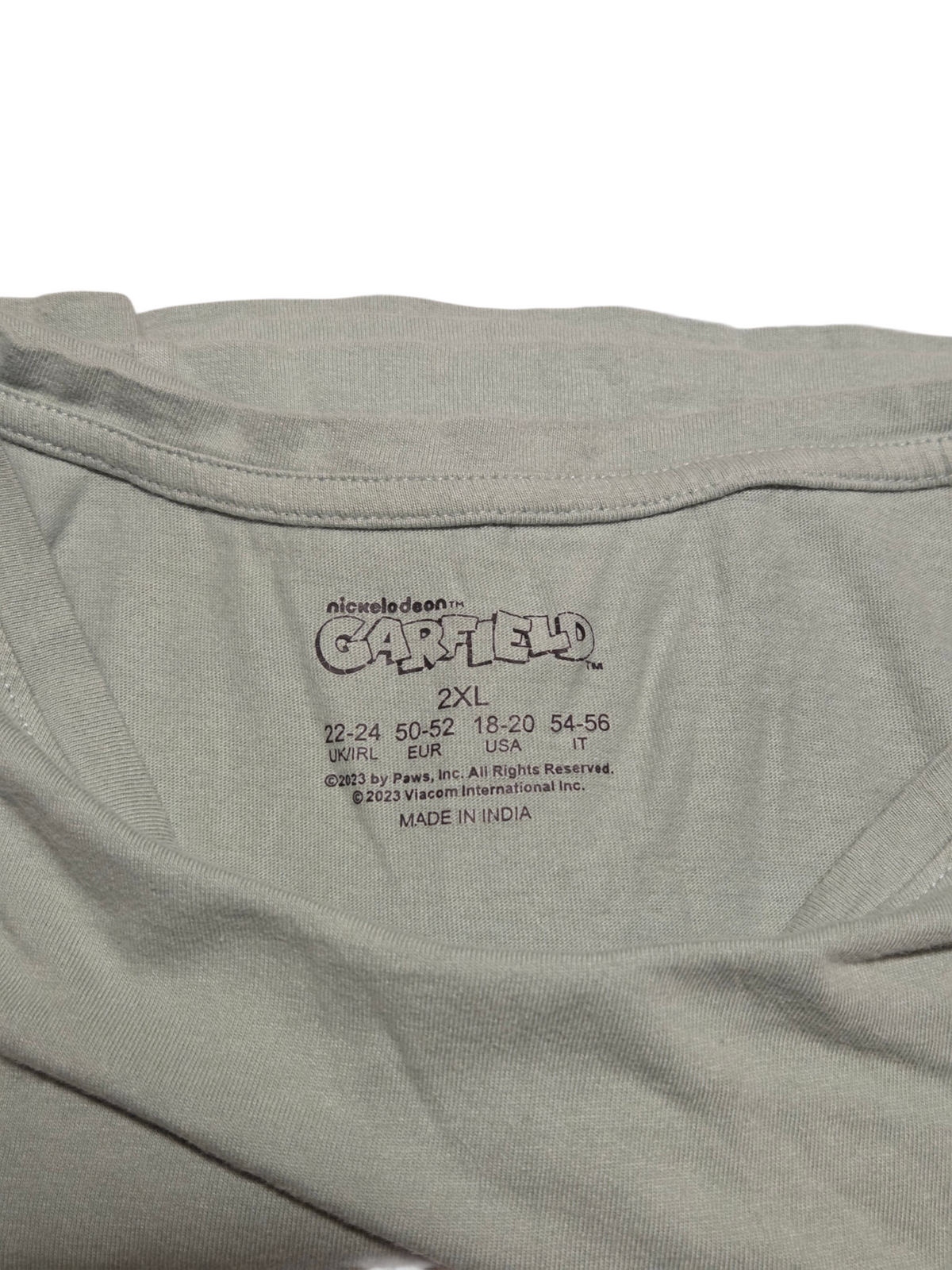 Nickelodeon Garfield printed 2XL label with US 18–20 size conversion