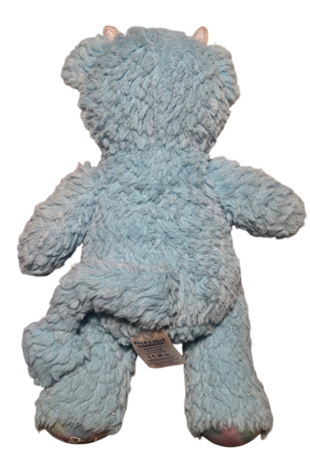 Enchanted Dragon back showing tail and manufacturer tag