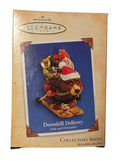 2004 Hallmark Downhill Delivery Nick and Christopher ornament box front with visible surface scuffs