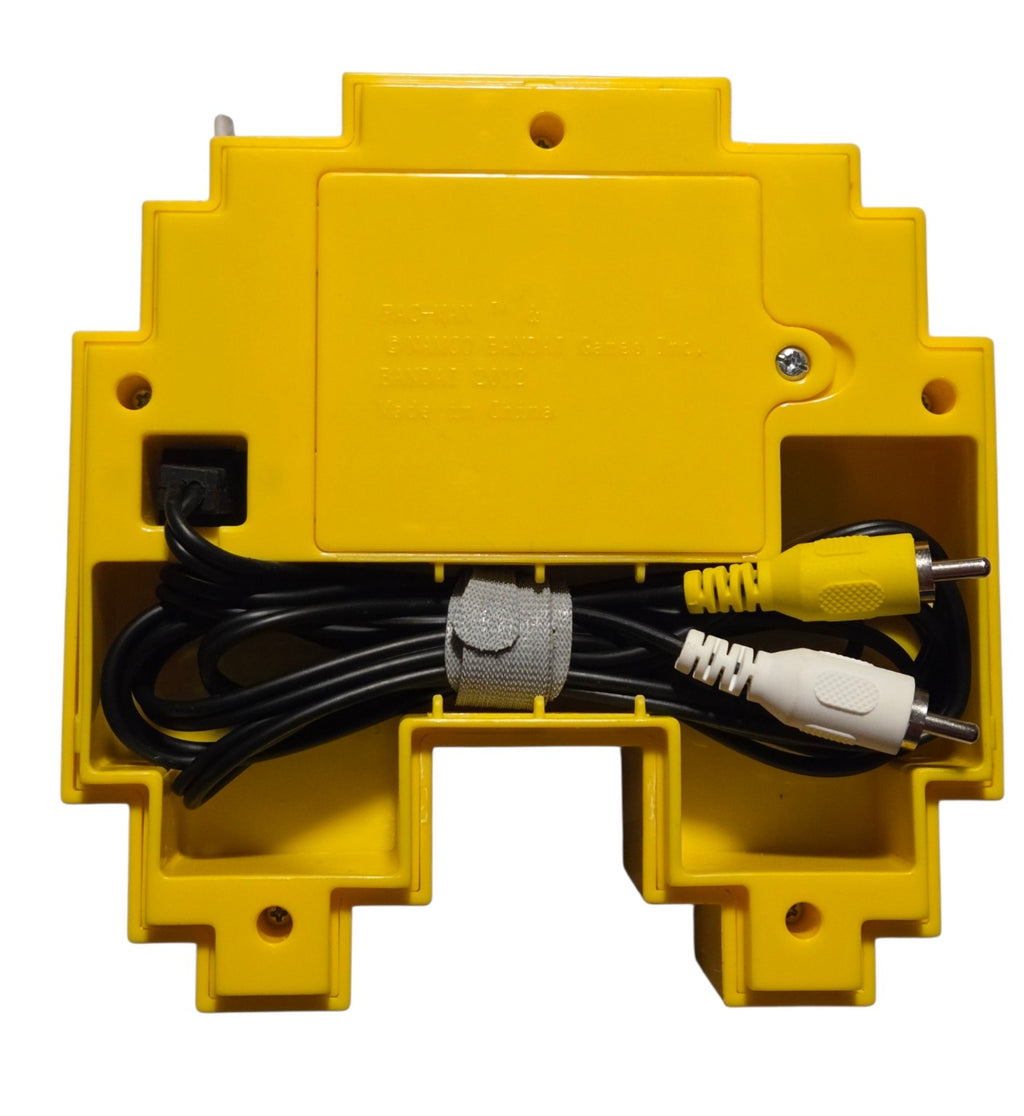 Underside with attached yellow and white RCA cables and battery cover