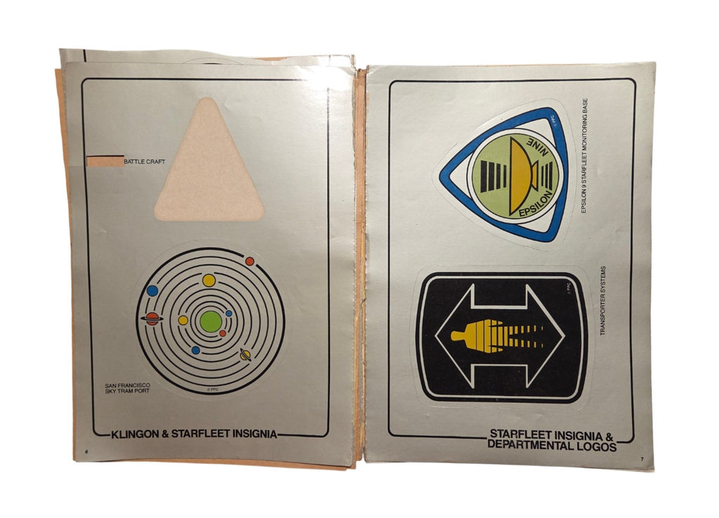 Klingon and Starfleet insignia pages with missing sticker