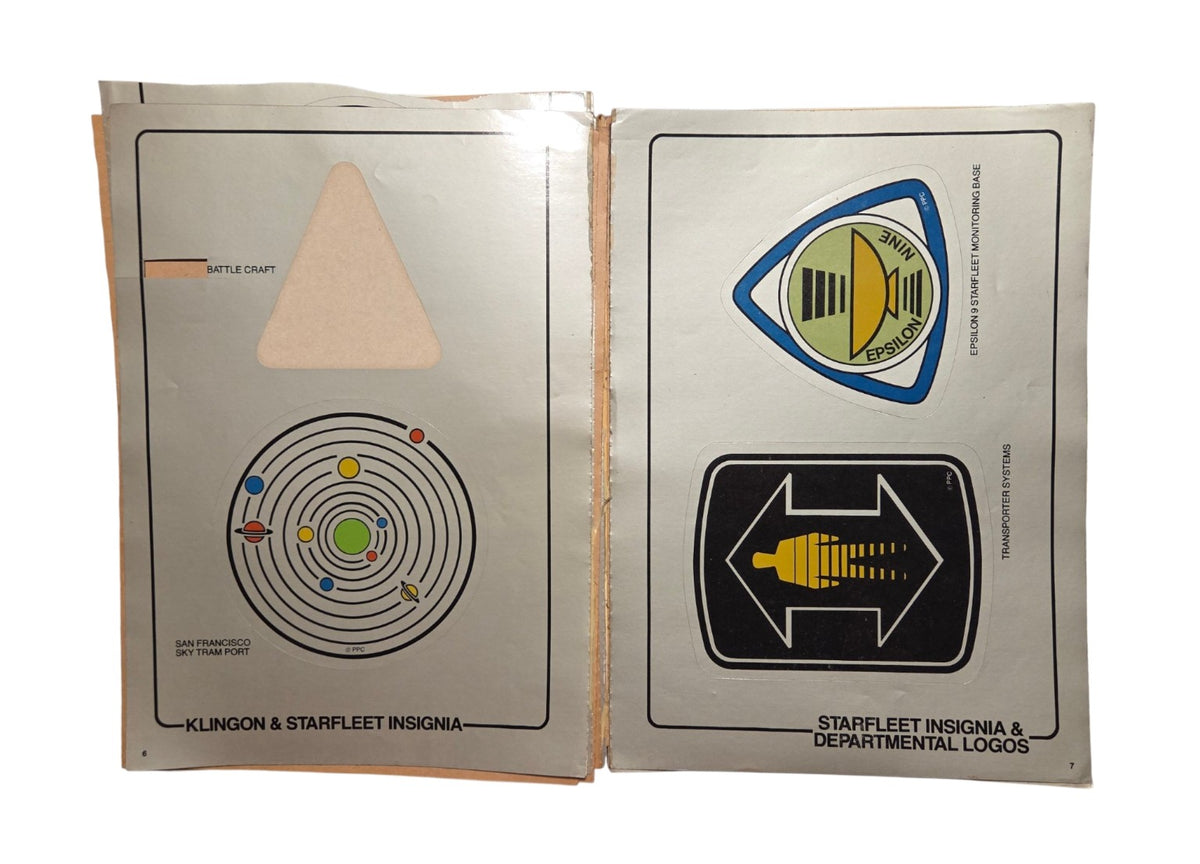 Klingon and Starfleet insignia pages with missing sticker