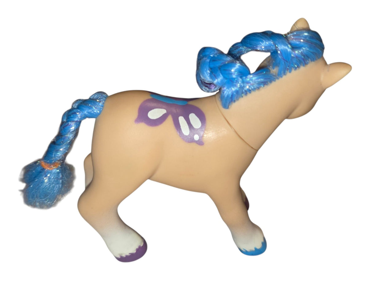 Right side of tan Lanard pony showing purple butterfly marking