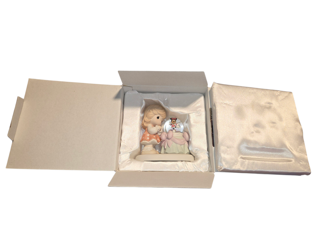 Precious Moments figurine in original box with satin packing