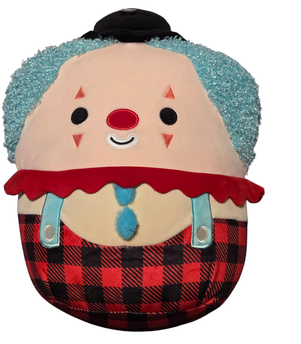 Ukee the clown Squishmallows plush front with teal hair and red plaid pants