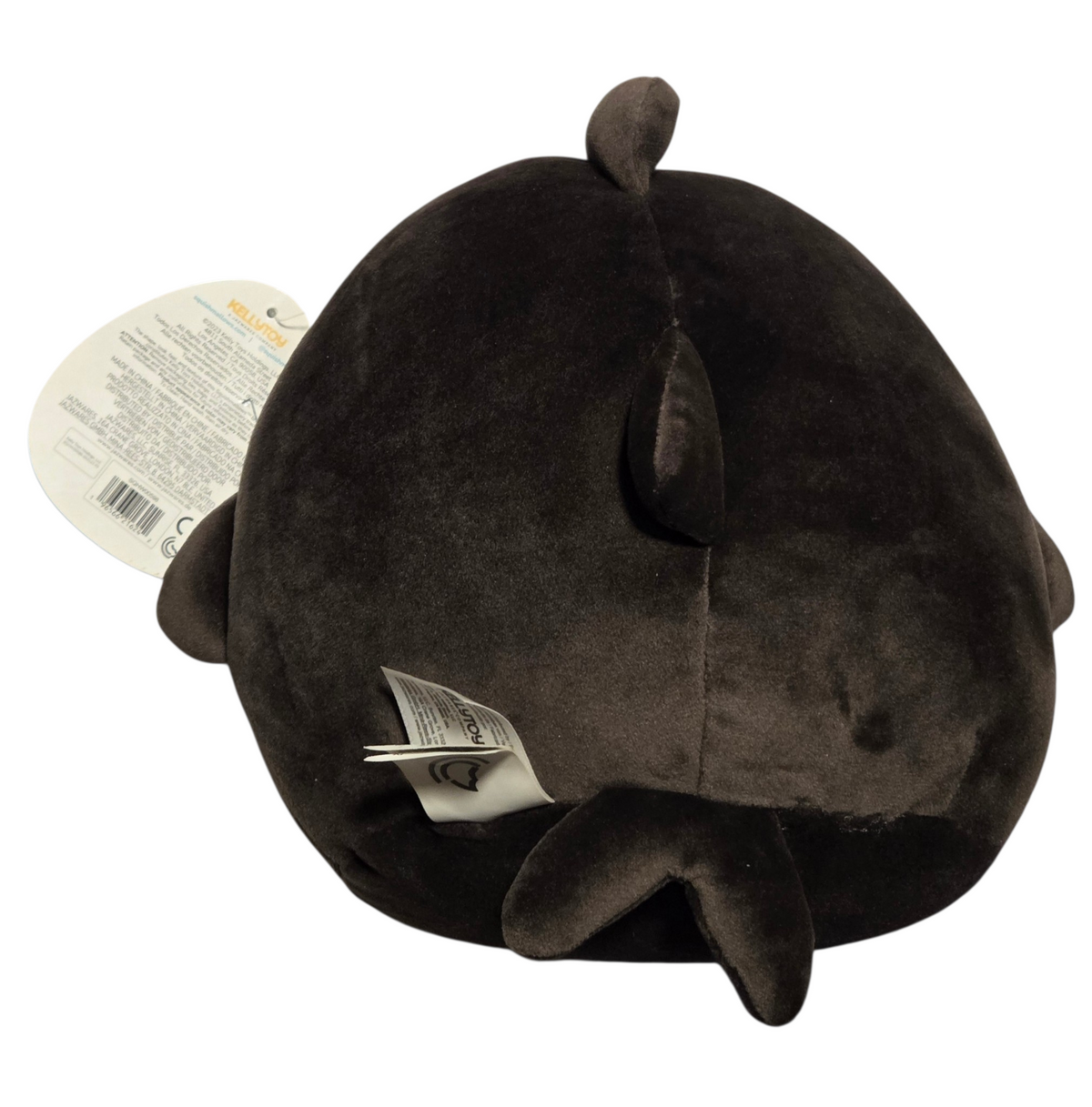 Rear of Oceana shark Squishmallows plush with attached tags