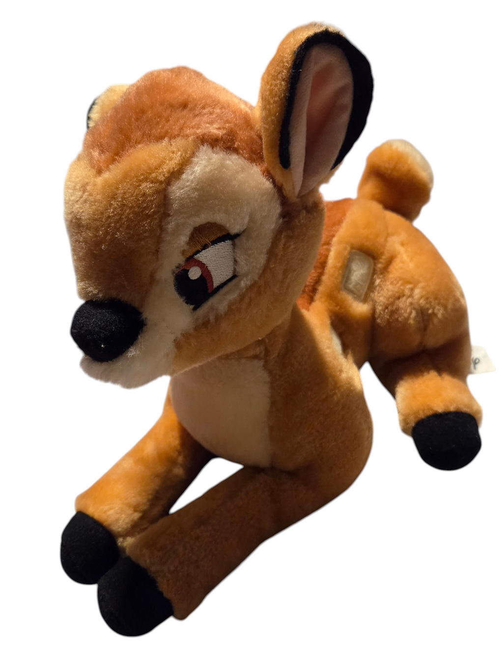 Vintage Disney Bambi plush front view with embroidered eyes and black hooves