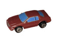 Galoob Micro Machines burgundy Cadillac Eldorado STS with blue windows and visible wear