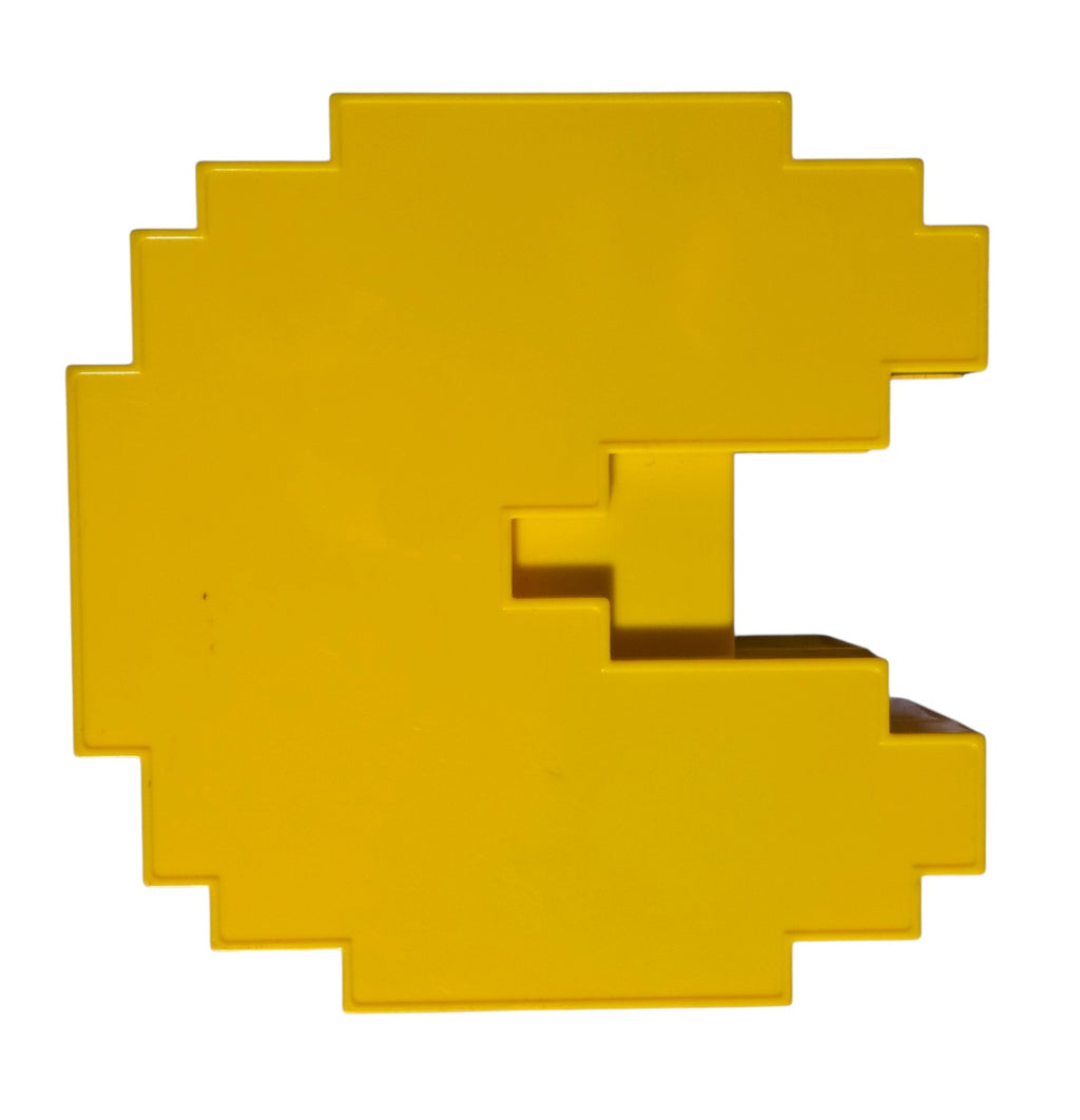 Plain yellow reverse side of Pac-Man plug-and-play console