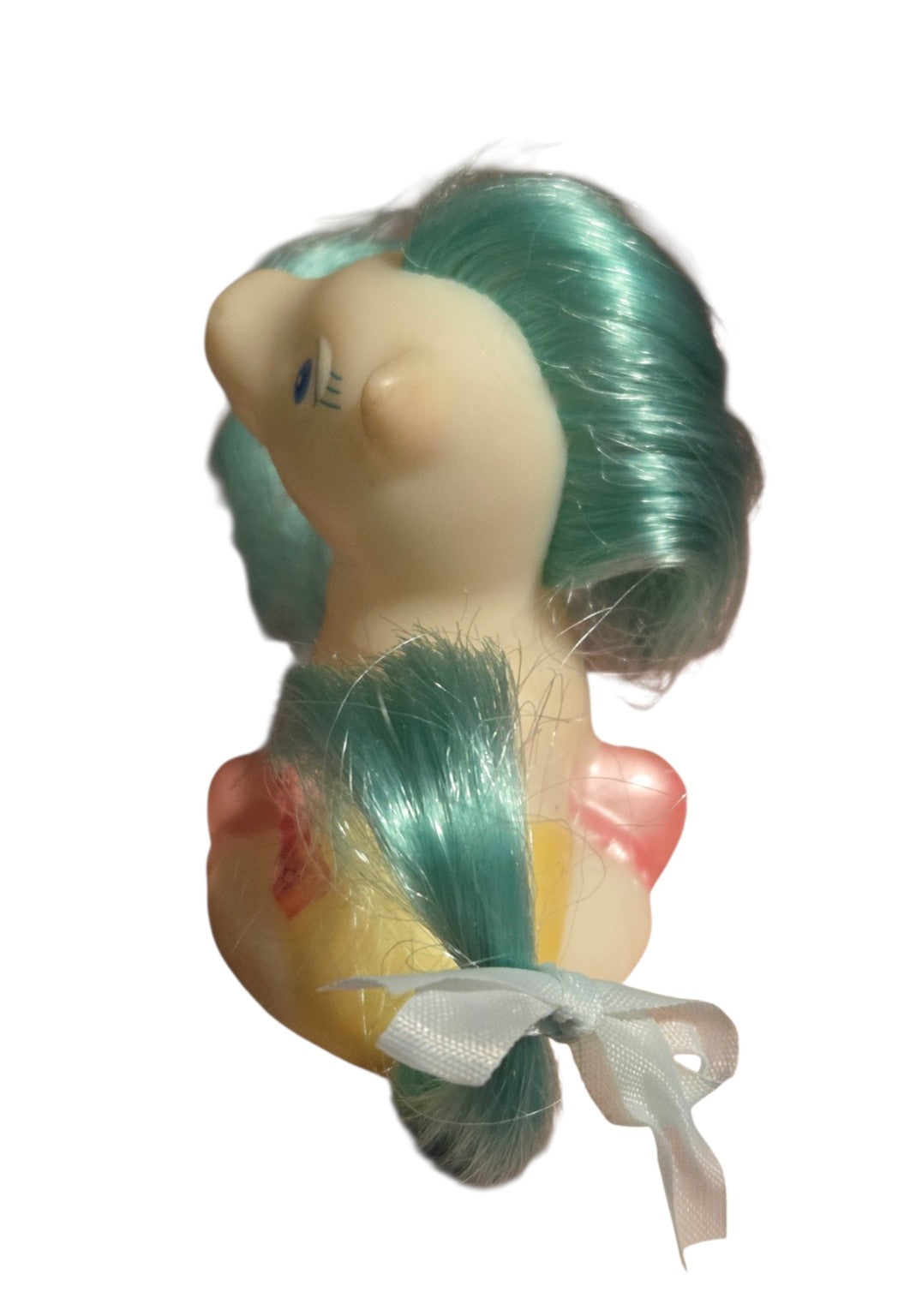 Side view of Tara Toy baby pony and tail ribbon