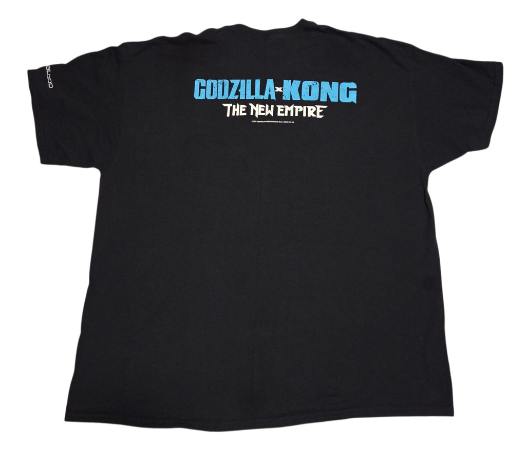 Back of Godzilla x Kong The New Empire shirt with blue and white movie logo