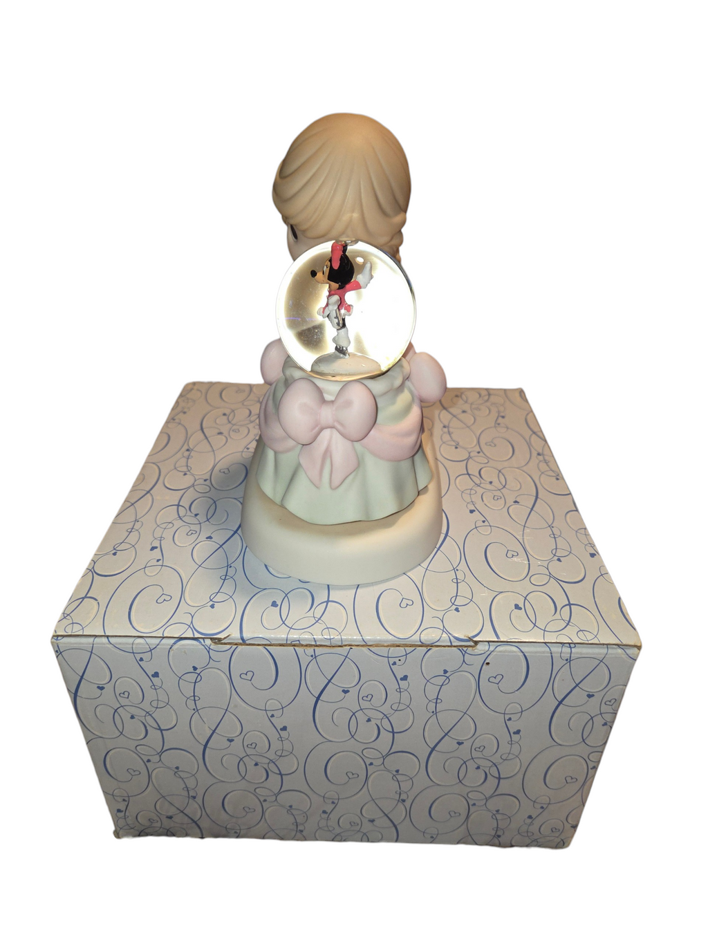 Minnie Mouse snow globe side view with pastel pink bows