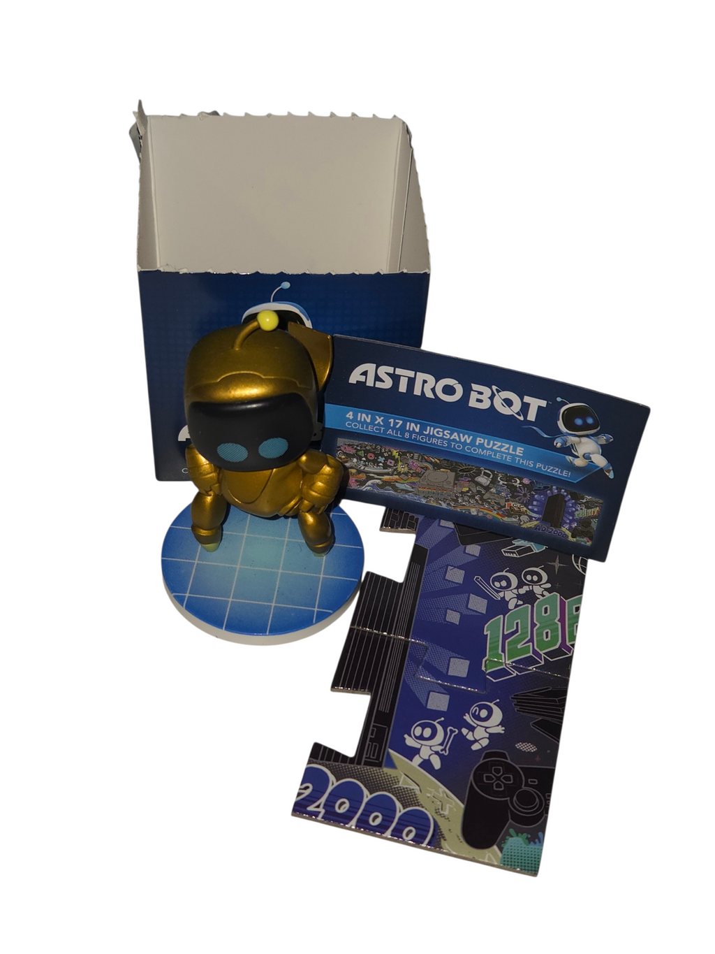 CultureFly Astro Bot gold chase vinyl figure with opened blind box, insert and puzzle pieces