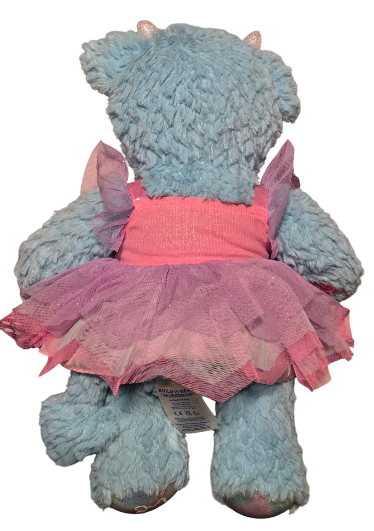 Enchanted Dragon plush back wearing fairy dress