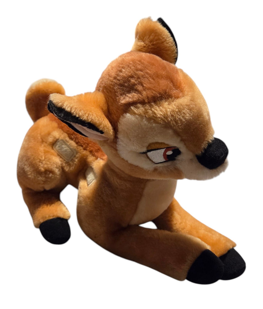 Bambi plush side view showing cream square spots