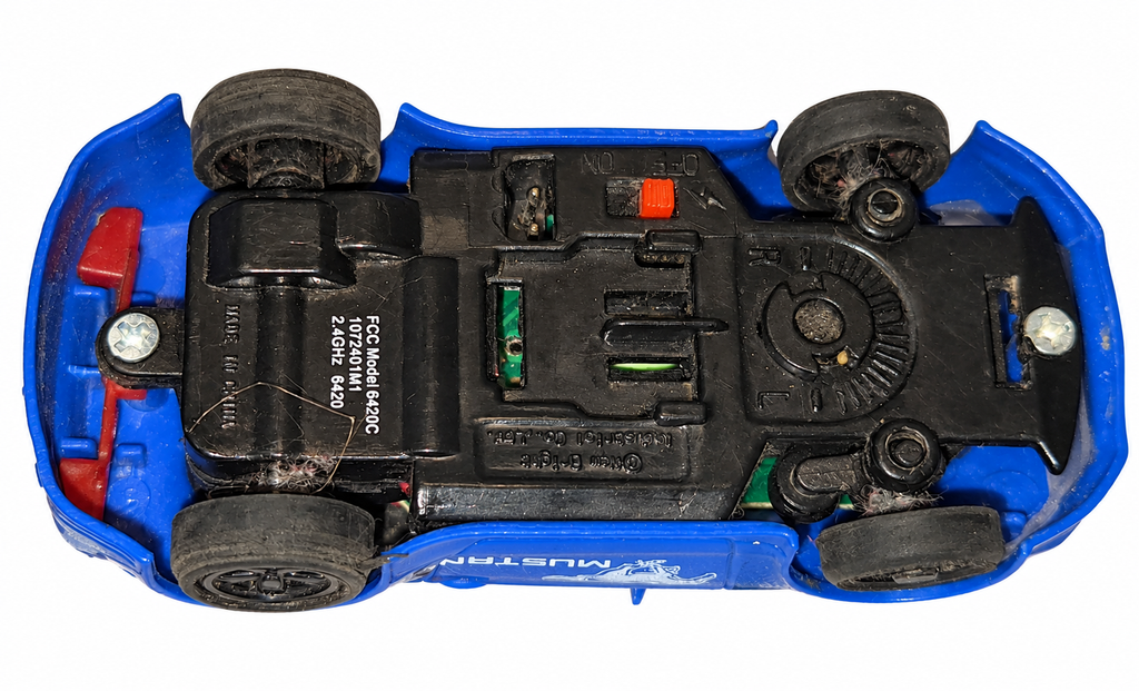 New Bright Nano Racer Mustang blue RC car underside on white background