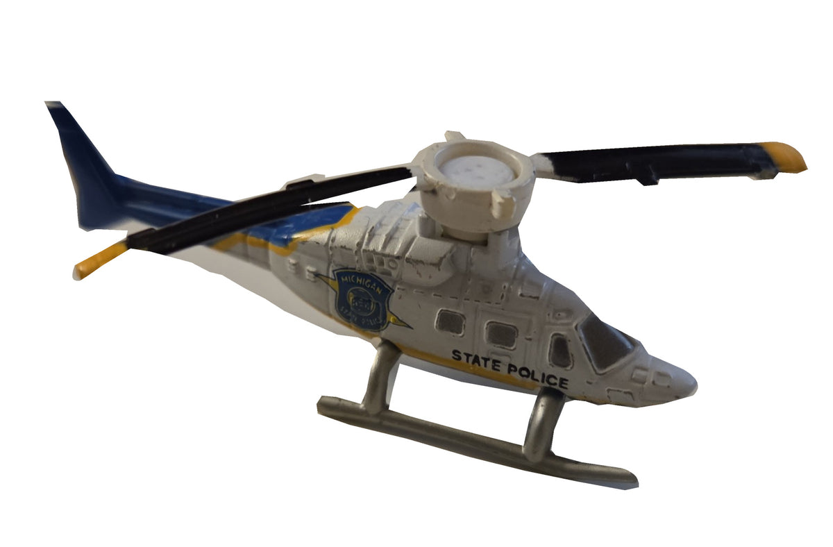 Preowned Micro Machines Michigan State Police helicopter on white background