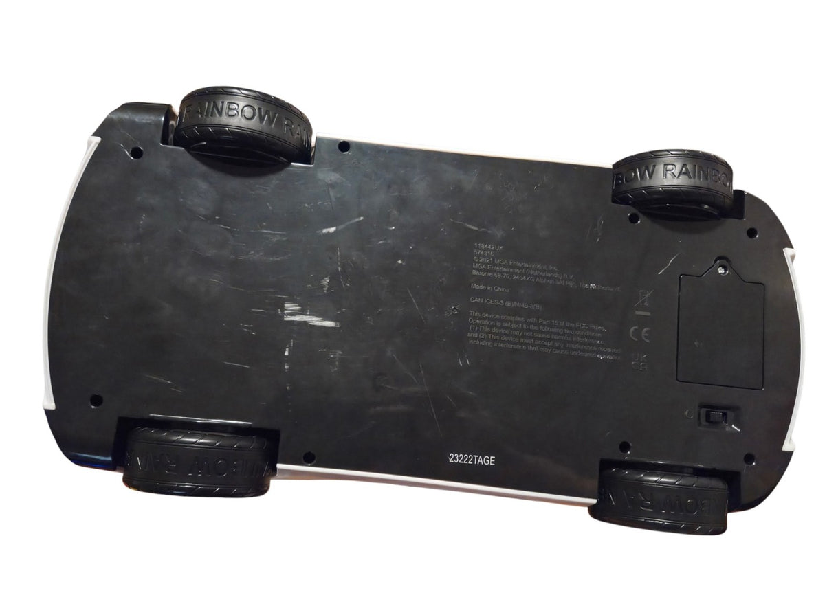 Underside of Rainbow High car showing MGA markings and scratches