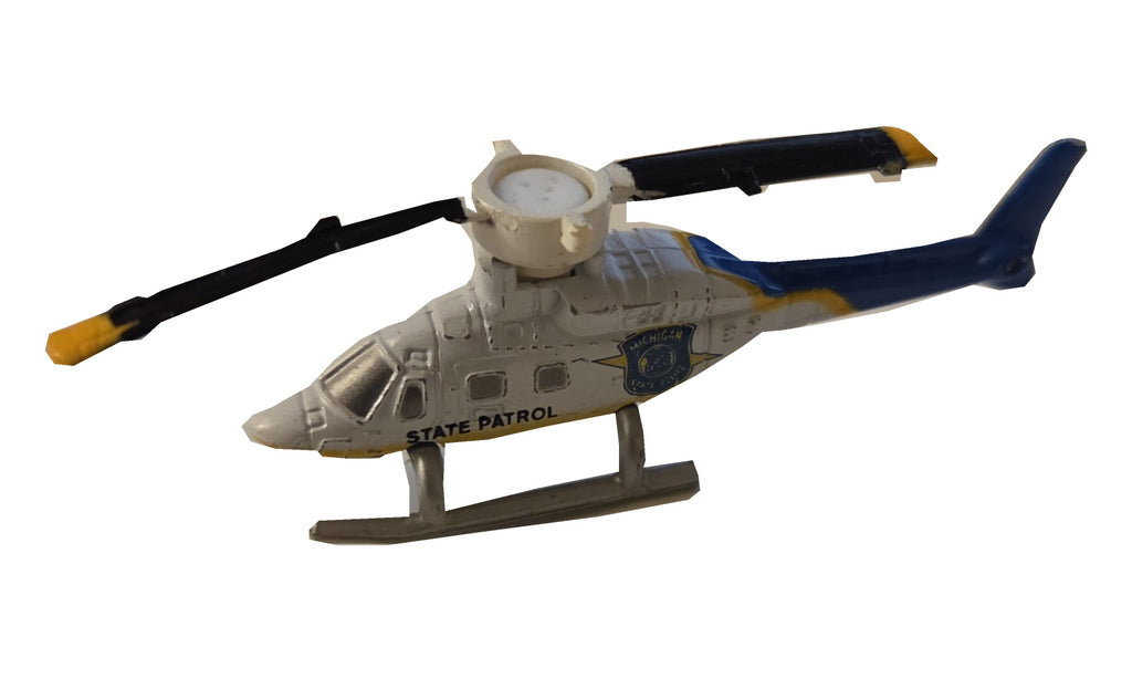 Preowned Micro Machines Michigan State Police helicopter on white background