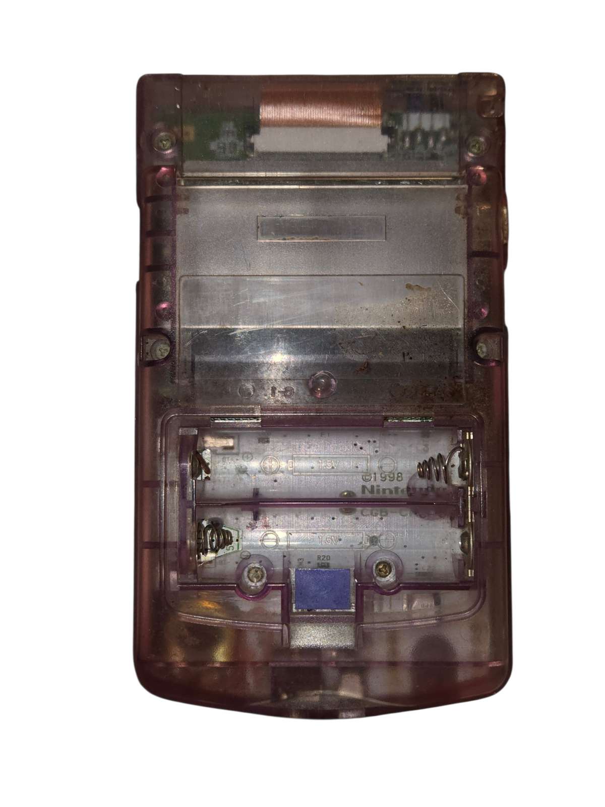 Rear of Game Boy Color with missing battery cover and visible compartment
