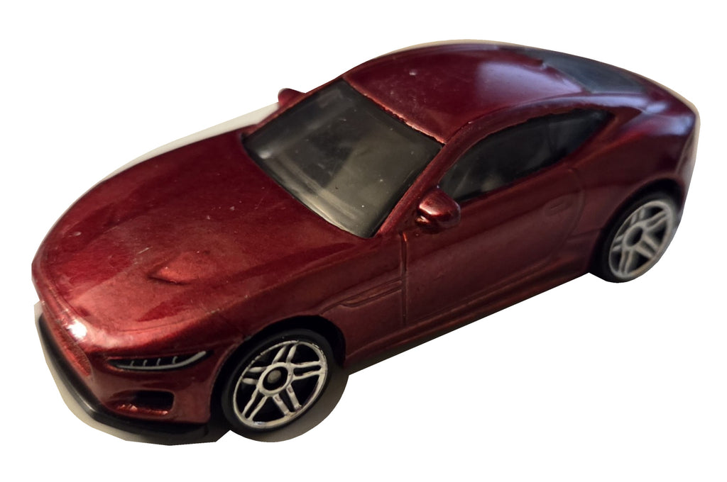 Preowned Hot Wheels red Jaguar F-Type on white background