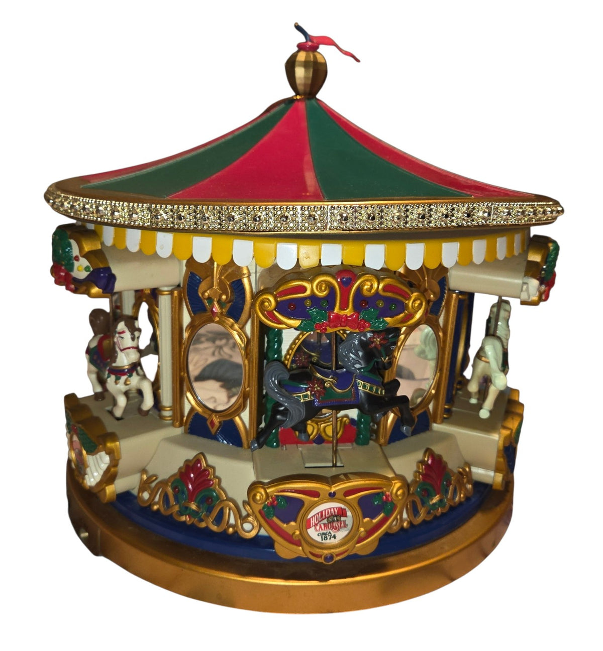 Carousel reverse angle showing horses and painted decoration