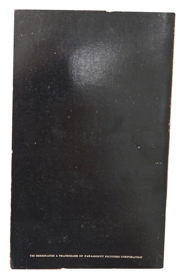 Back cover showing rubbing and edge wear