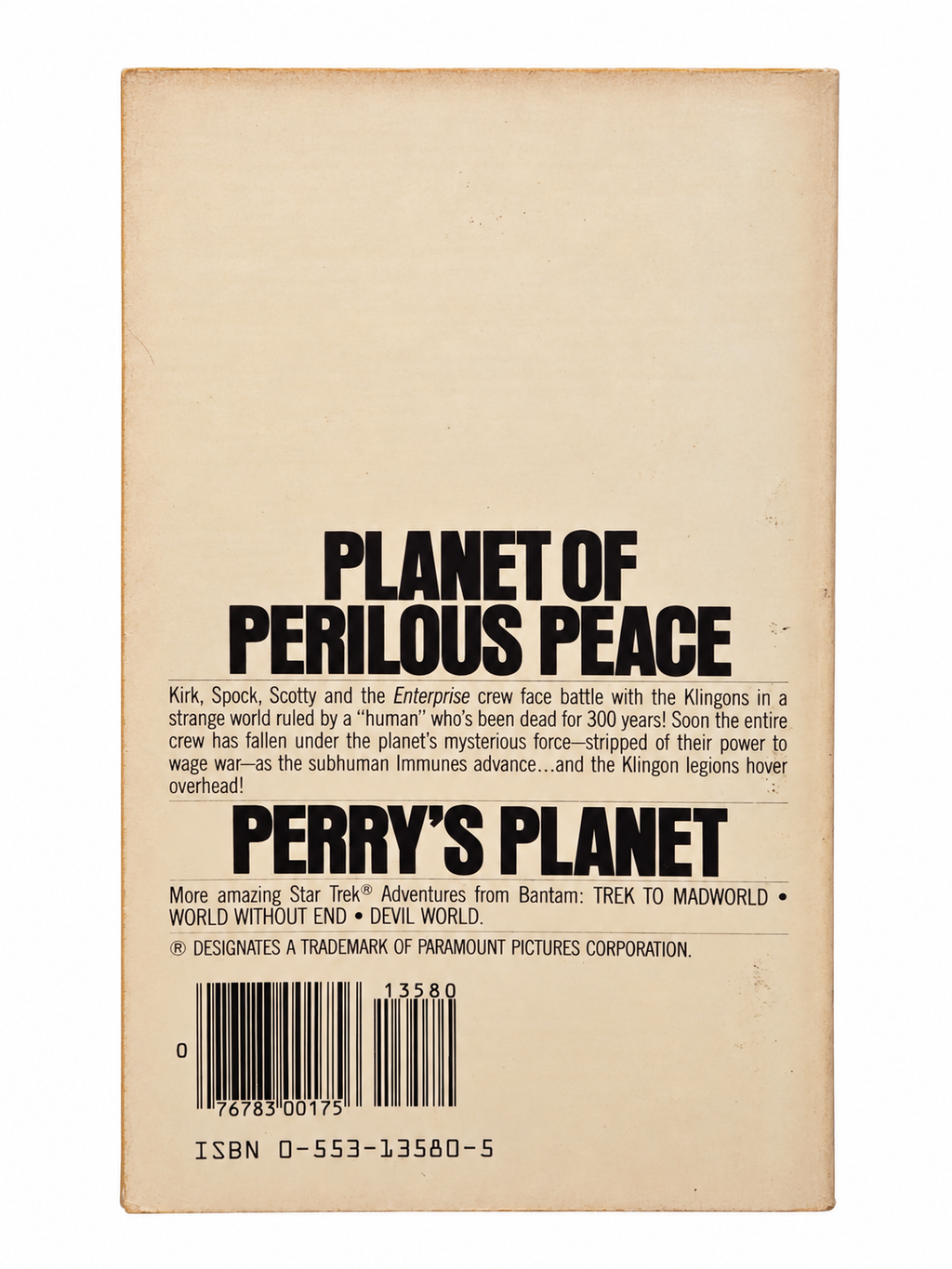 Perry’s Planet back cover showing original age discoloration and wear on white background