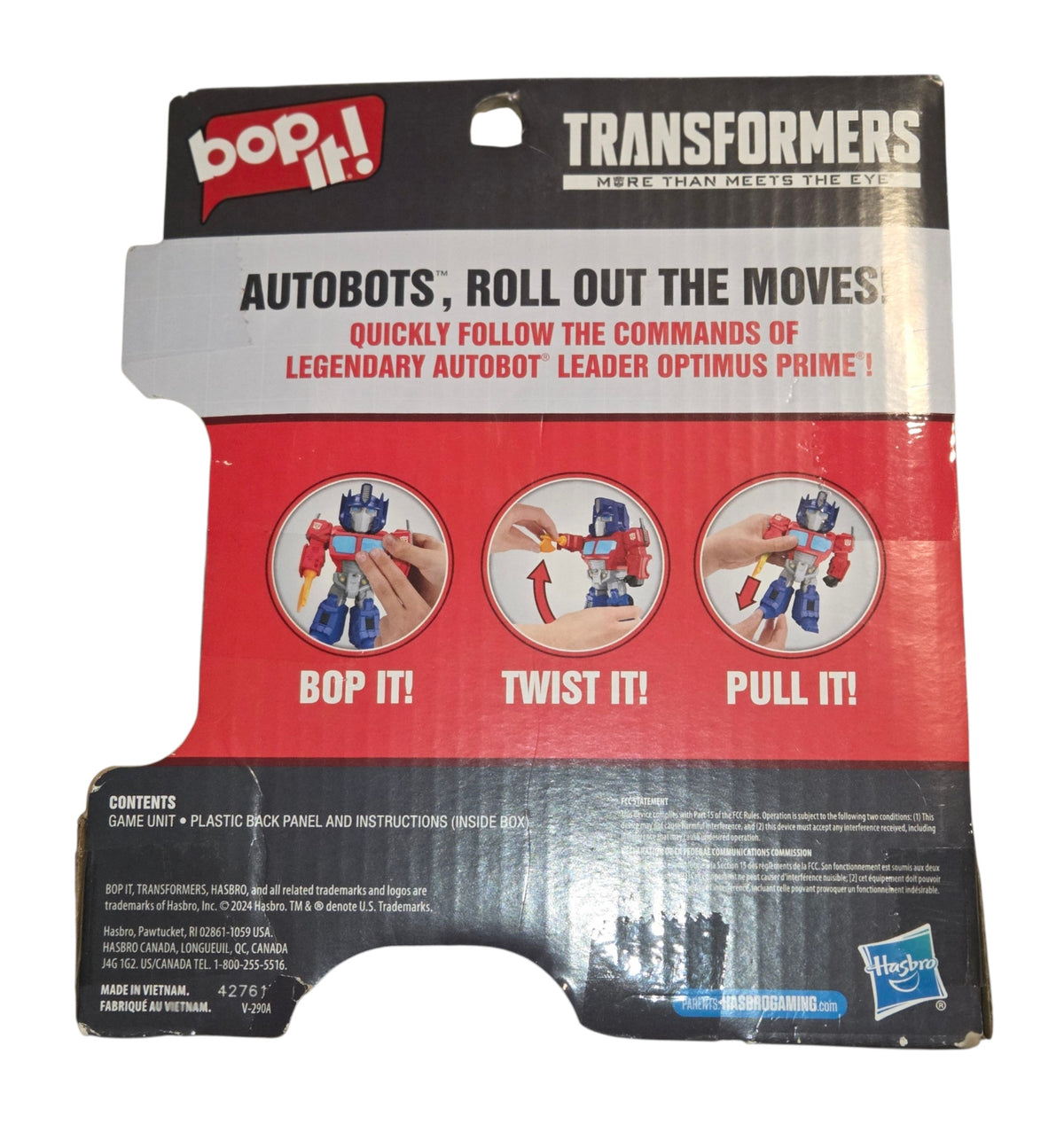 Hasbro Optimus Prime Bop It game package back showing bop twist and pull commands