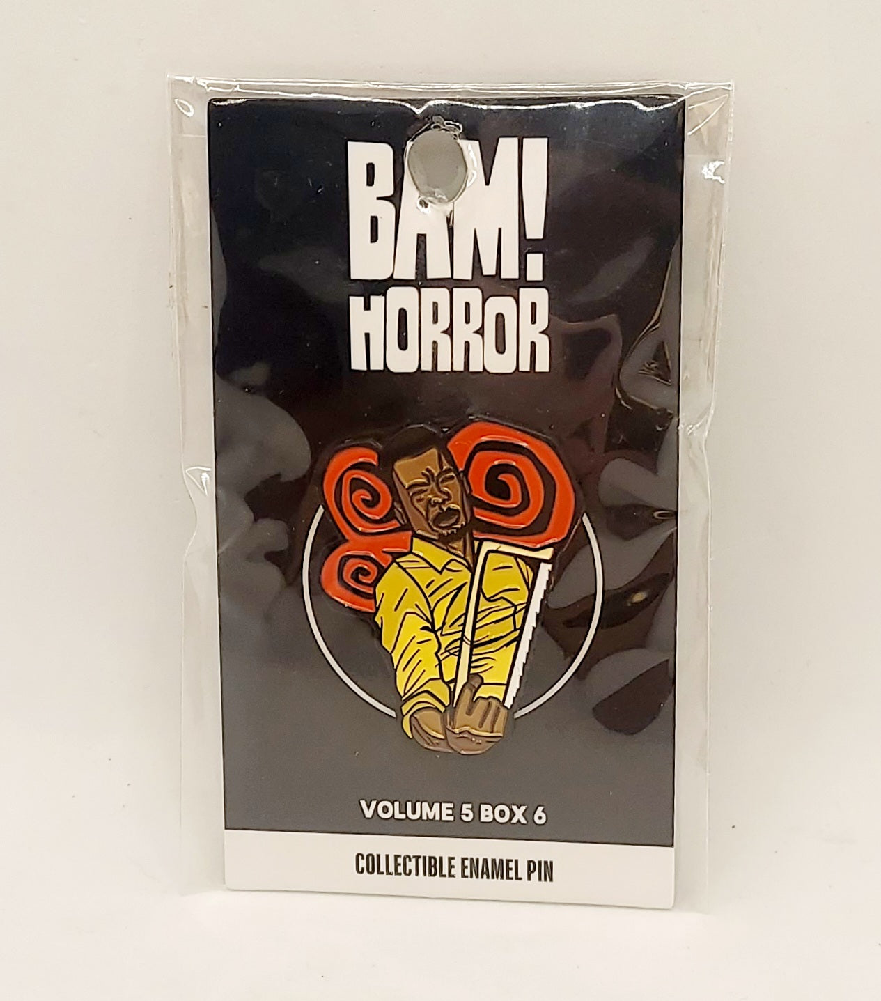 Exclusive BAM Horror Spiral Book of Saw Enamel Pin