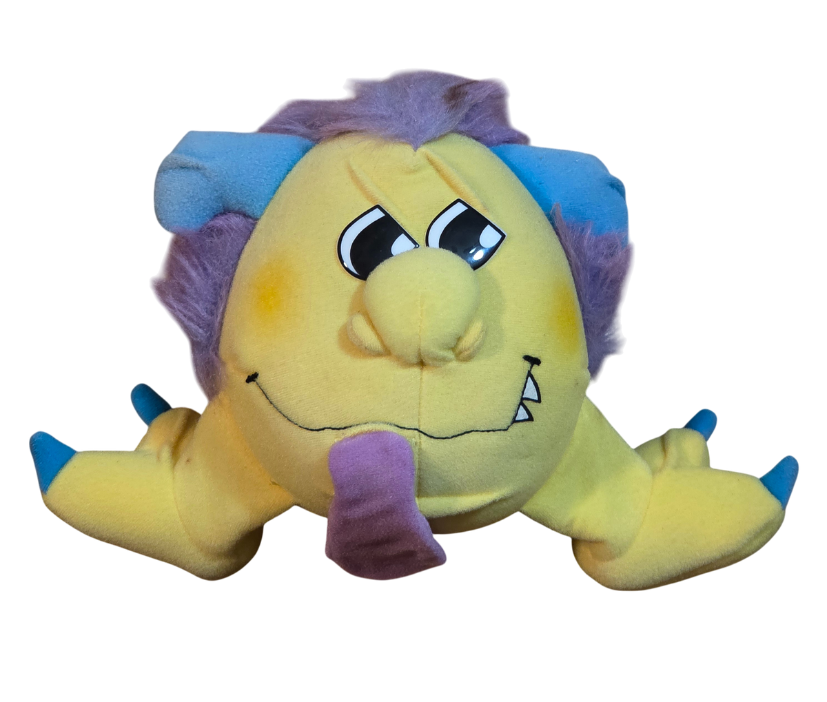1986 Matchbox Grumples Razzcale Toy Yellow Purple Rasberry Blowing Plush