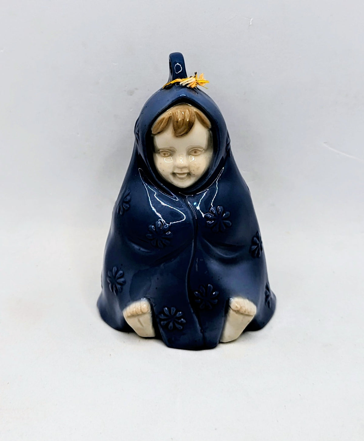 AA Importing St Louis 4.5" Ceramic Baby Wrapped In Blue Blanket Bell Ornament