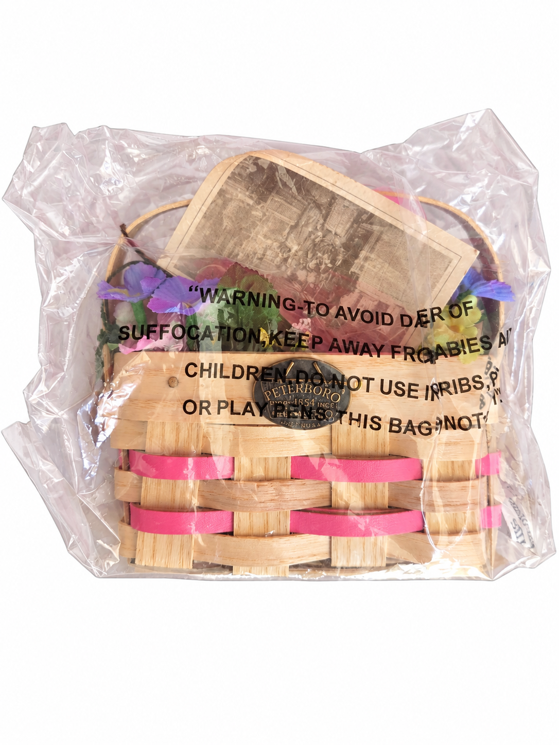 Included bagged basket accessory with flowers