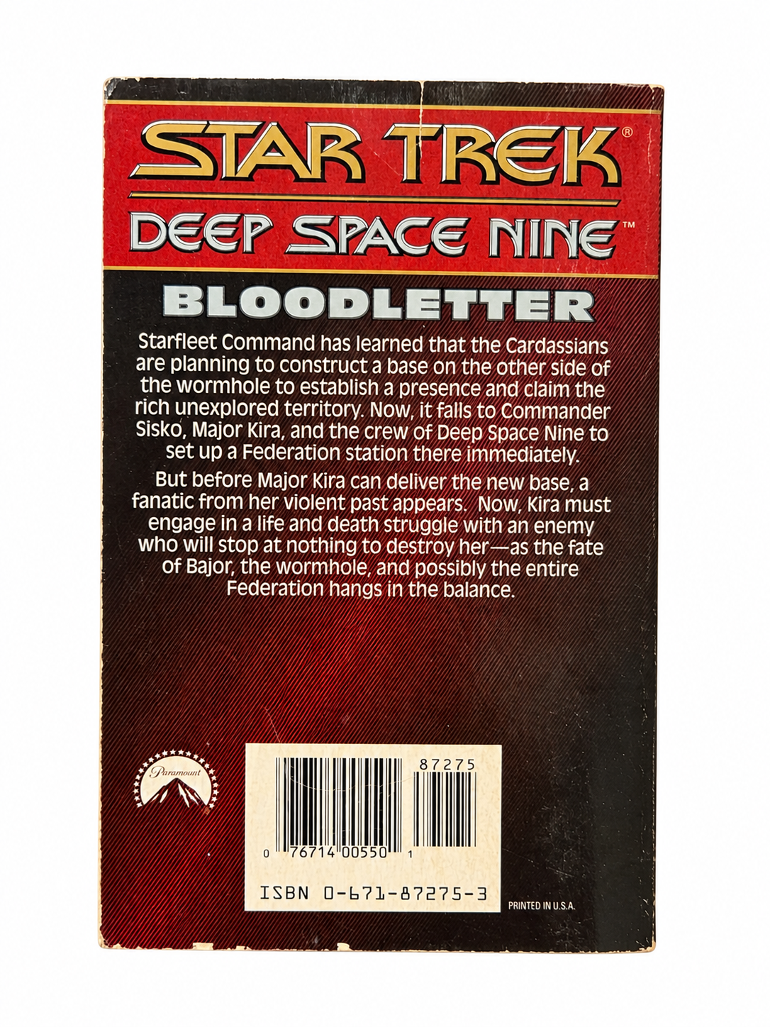 Bloodletter back cover showing creases and edge wear
