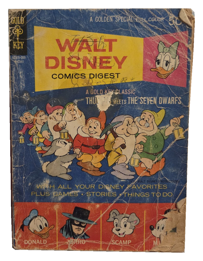Walt Disney Comics Digest 24 original front cover showing handwriting and heavy damage