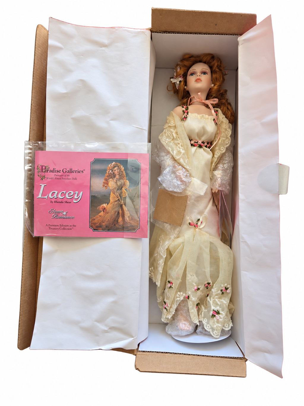 Brand new Lacey doll by Rhonda Shear in original opened packaging with booklet