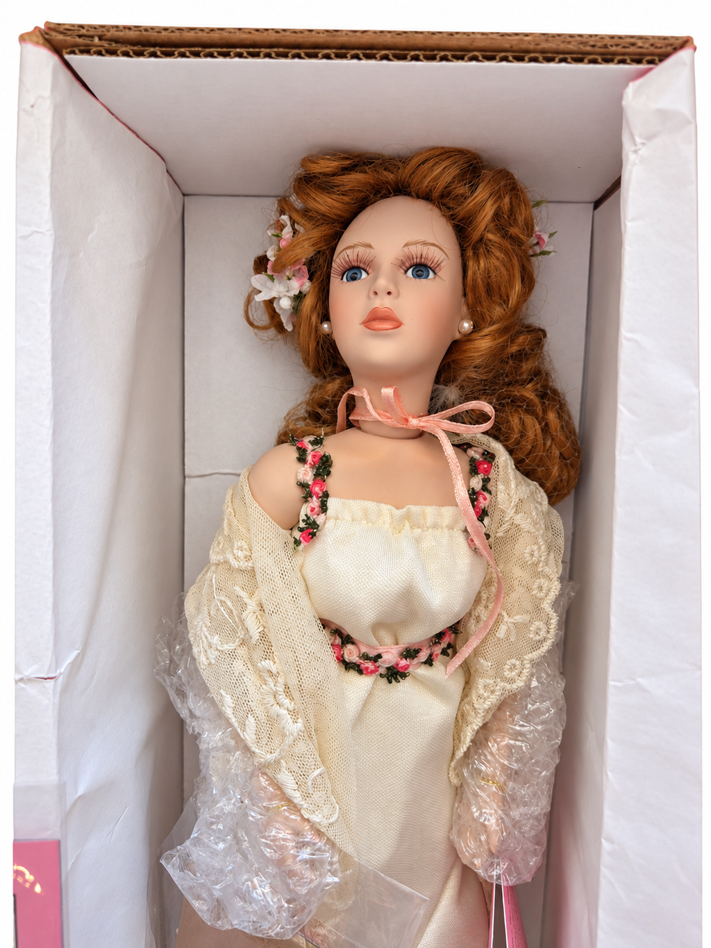 Lacey doll face and ivory lace gown detail