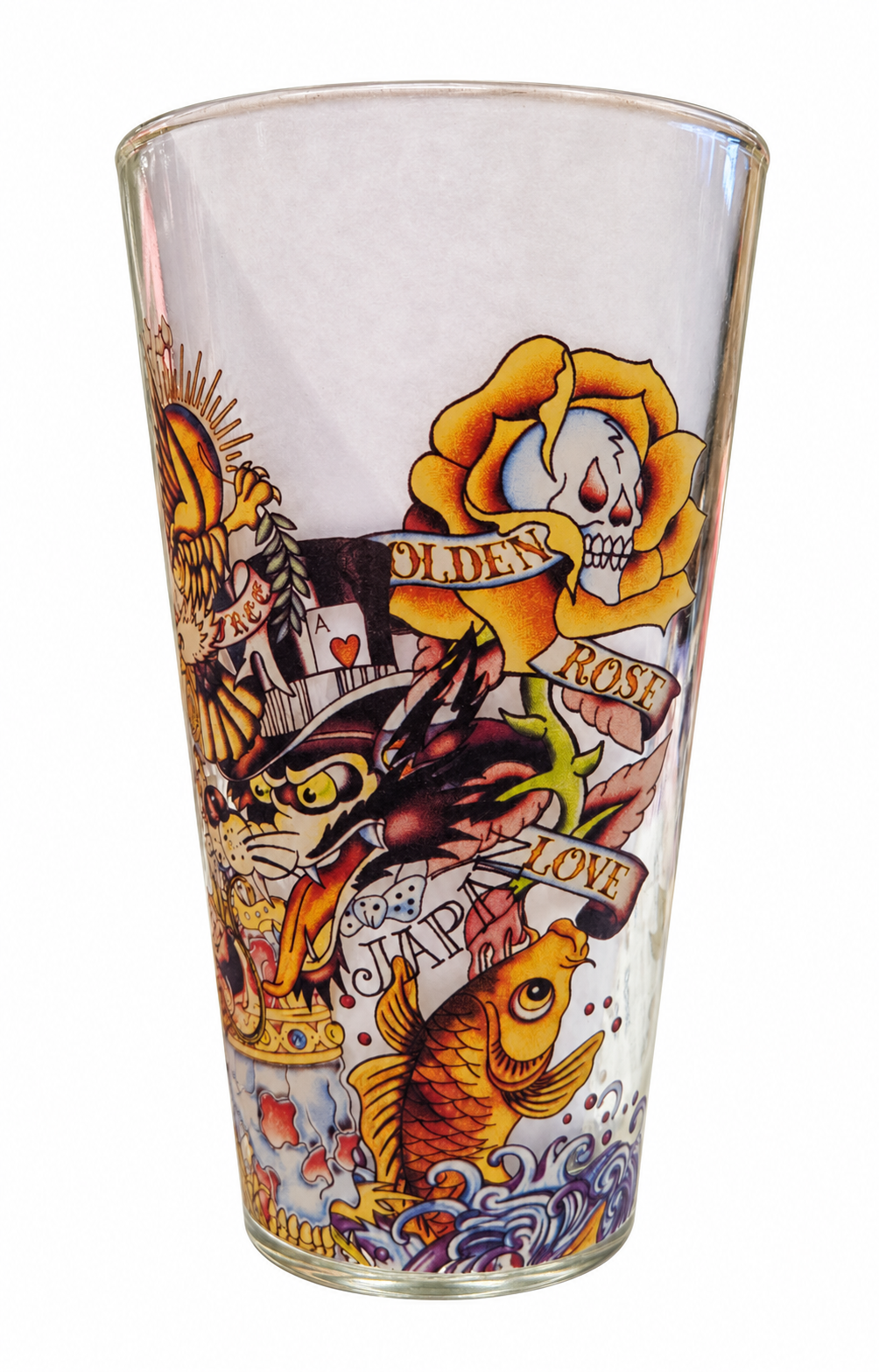 Ed Hardy tattoo collage drinking glass rose and koi view on white background