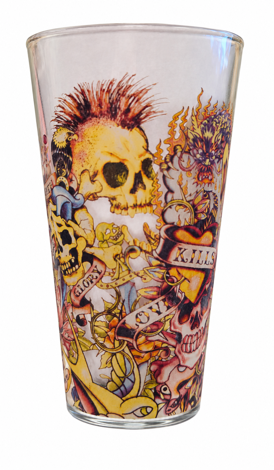 Ed Hardy tattoo collage drinking glass skulls view on white background