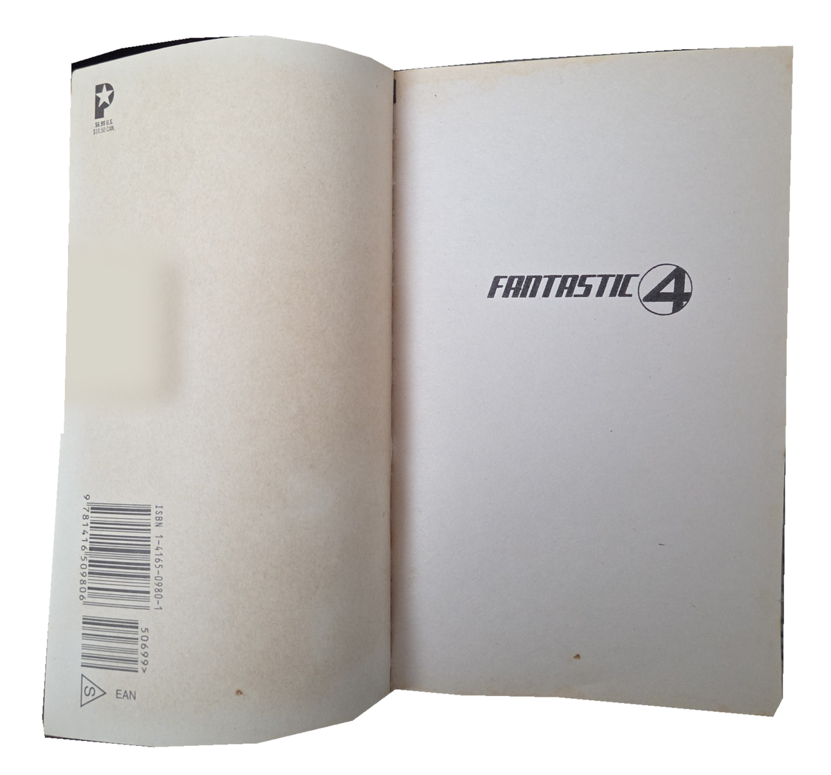 Fantastic Four interior opening page showing yellowed paper and small spots