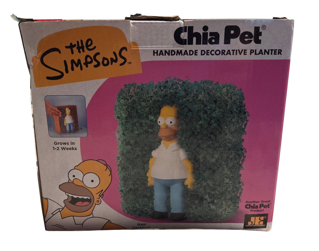Homer Simpson Chia Pet new in box with bent top flaps and packaging wear on white background