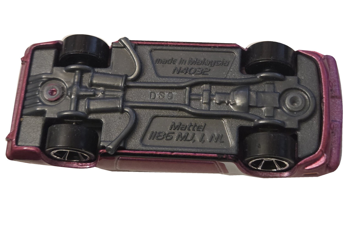 Pre-owned Hot Wheels 1970 Plymouth AAR Cuda metallic magenta underside view on white background