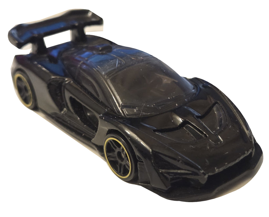 Pre-owned Hot Wheels McLaren Senna black front-left view on white background showing actual condition