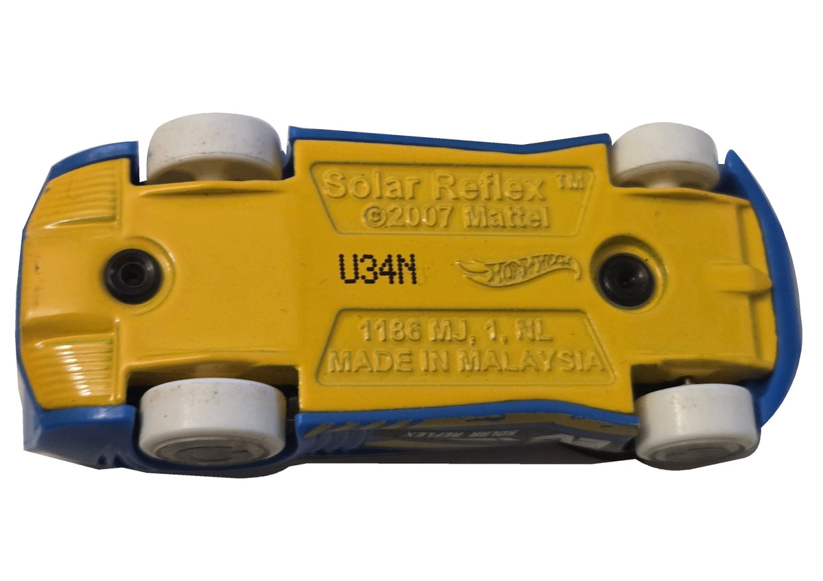 Pre-owned Hot Wheels Solar Reflex blue and yellow underside view on white background showing actual condition