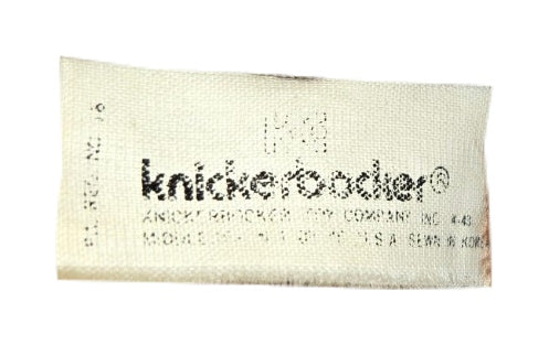 Vintage Knickerbocker Curious George plush tag view on white background