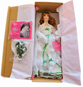 Brand new Maureen Irish Bride in original box with booklet and packaged bouquet