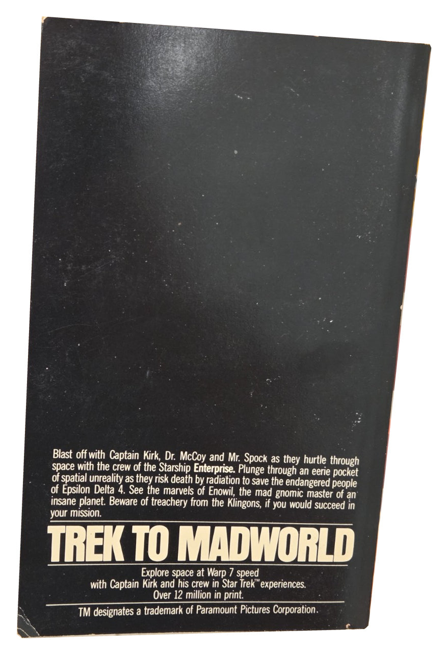 Trek to Madworld back cover showing wear
