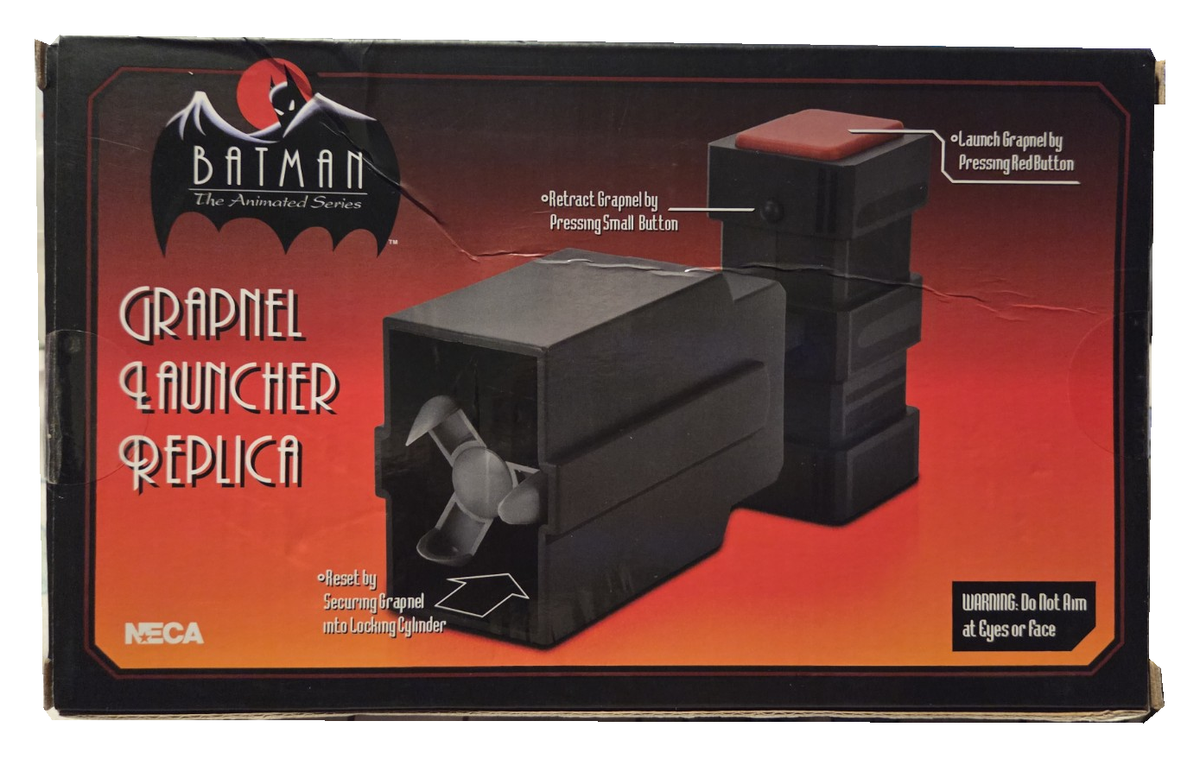 NECA Batman The Animated Series Grapnel Launcher box back, showing original packaging wear